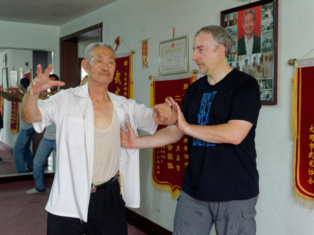 Master Guo Guizhi teaching Philippe Munn